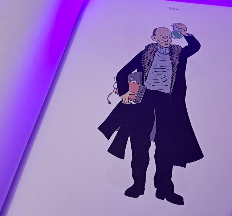 Eine Seite aus dem besprochenen Band: Heinrich Faust mit einem MacBook unter dem Arm, gezeichnet von Simon Schwartz.